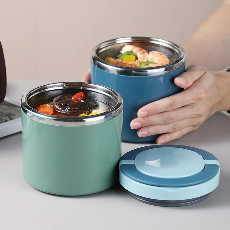 Green and blue lunch jars filled with food