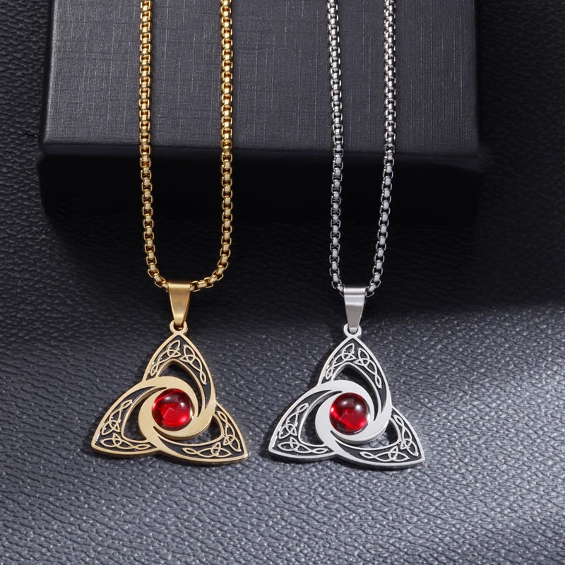 Celtic Trinity Knot necklace in gold and silver with red crystal centre