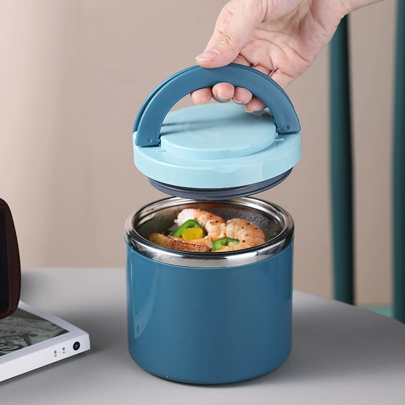 Blue lunch jar with the lid lifted, showing the stainless steel inner pot