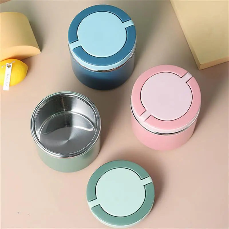 Pink, blue and green lunch jars from above